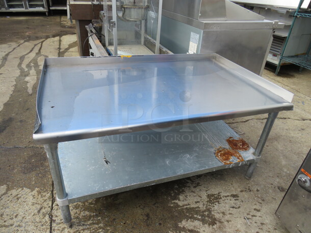 One Stainless Steel Equipment Table With  Under Shelf. 49X31X26