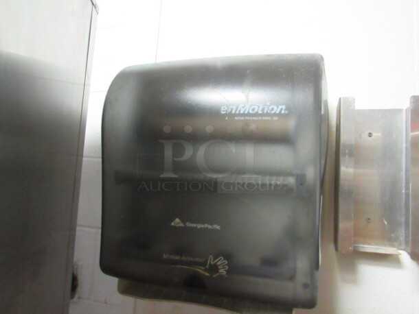 One Wall Mount En Motion Hands Free Automatic Paper Towel Dispenser. BUYER MUST REMOVE