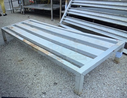 One 60X24X8.5 Aluminum Dunnage Rack.