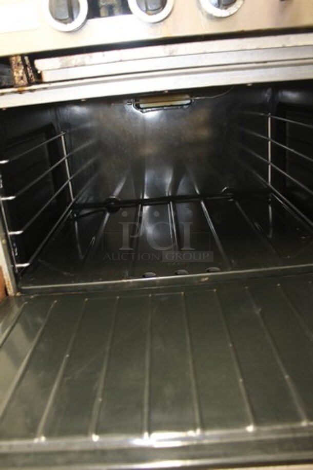 Garland PS-24G-6-2628 Stainless Steel Commercial Natural Gas Powered 6 Burner Range w/ Left Side Flat Top Griddle, 2 Ovens, Over Shelf and Back Splash. - Image 5 of 7