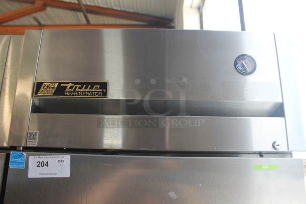 2015 True TG1R-1S ENERGY STAR Stainless Steel Commercial Single Door Reach In Cooler w/ Poly Coated Racks on Commercial Casters. 115 Volts, 1 Phase. Tested and Working! - Image 2 of 8