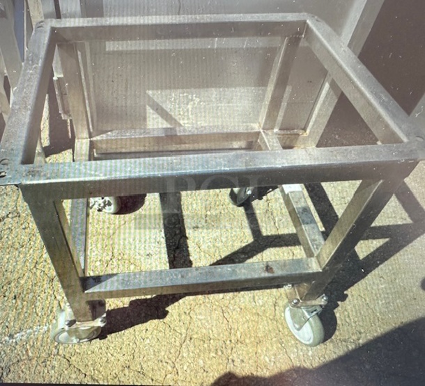 One Stainless Steel Table Frame On Casters. 25X20X23.5 - Image 1 of 1