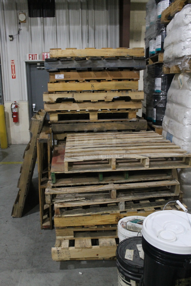 ALL ONE MONEY! Lot of 26 Wooden Pallets. BUYER MUST REMOVE. - Image 1 of 3