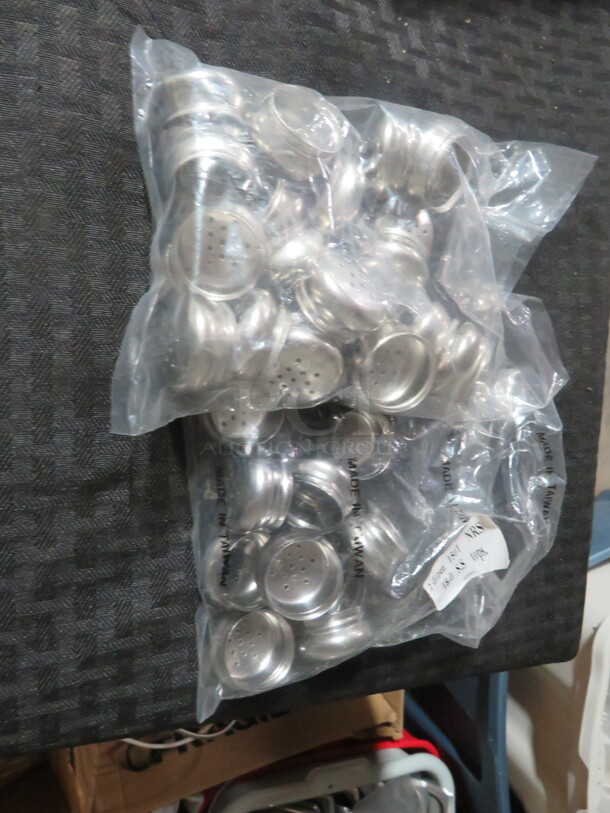 One Lot Of NEW Salt/Pepper Shaker LIDS. - Image 1 of 1