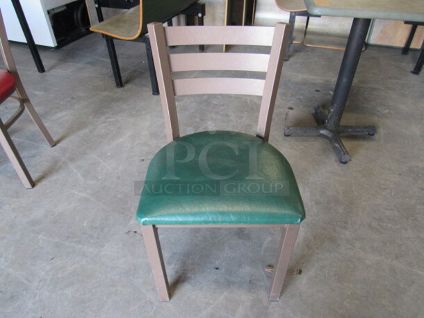 Brown Metal Chair With Green Cushioned Seat. 2XBID