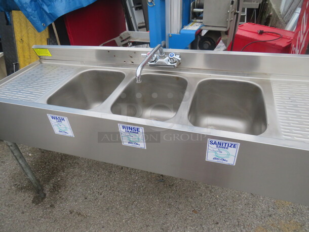 One SS Krowne 3 Compartment Bar Sink With R/L Drain Board, Back Splash, And Faucet. Model# 18-534. 60X18X33 - Image 2 of 2