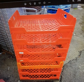 One Lot Of 7 Bread Racks On A Dolly.