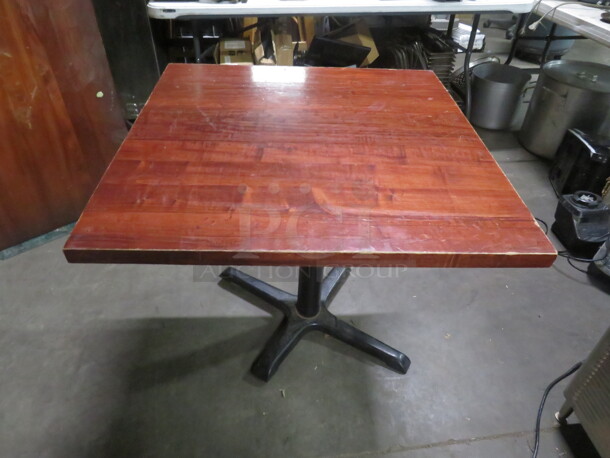 One Solid Wooden Table, 1-1/4 Inch Thick, On A Pedestal Base. 30X30X29  - Image 1 of 2