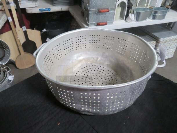 One 17 Inch Aluminum Collander.  - Image 1 of 1