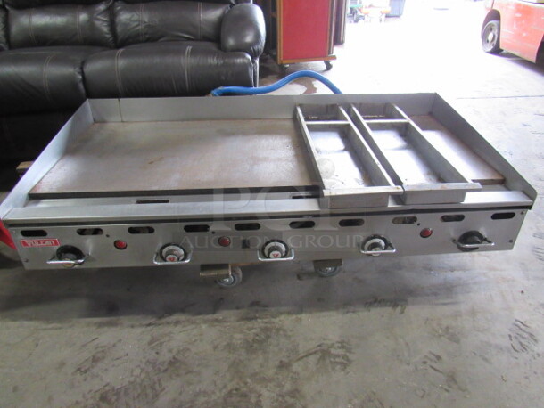 One AWESOME Vulcan Natural Gas Griddle With Thermostatic Controls. Model# MSA-60-10. 60X32X11. $8920.00