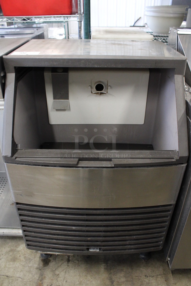 Manitowoc Model QF0406A Stainless Steel Commercial Self Contained Ice Machine. 115 Volts, 1 Phase. 26x25x40