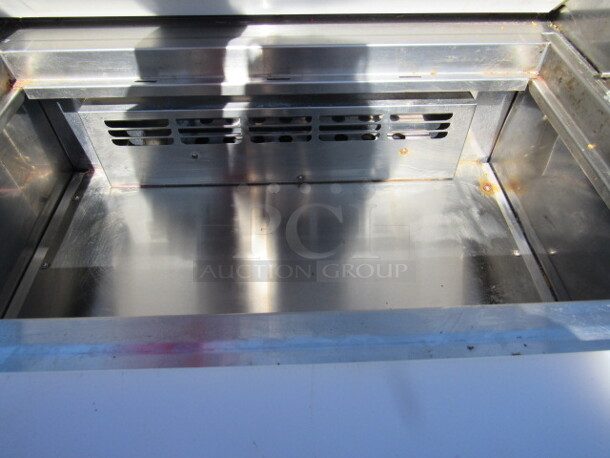 One SS Everest 1 Door Refrigerated Prep Table With Cutting Board On Casters. Model# EPBNR1. 115 Volt. 28X32X43.5 - Image 4 of 4
