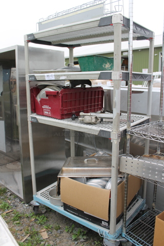 ALL ONE MONEY! Metro Lot of Various Items Including Metal Baking Pans. Does Not Include Shelving Unit.