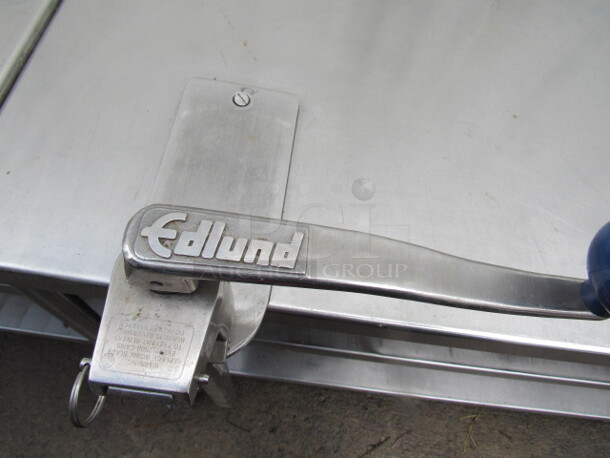 One Stainless Steel Table With 2 Stainless Under Shelves, And A 10lb Can Opener On Casters. 60X32X40 - Image 3 of 4