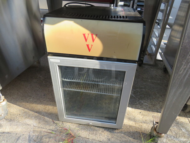 One ATC Counter Top Glass Door Display Cooler With 2 Racks. Model# CTB200. 115 Volt. 17X17X28.  - Image 1 of 2