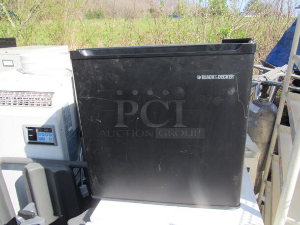 One Black And Decker Refrigerator. 120 Volt. Model# BCFA17B. 19X18X20.  Working - Image 1 of 5