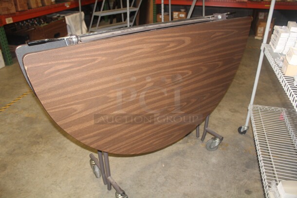 NICE! Round Folding Table On Casters. 60x39 - Image 2 of 3