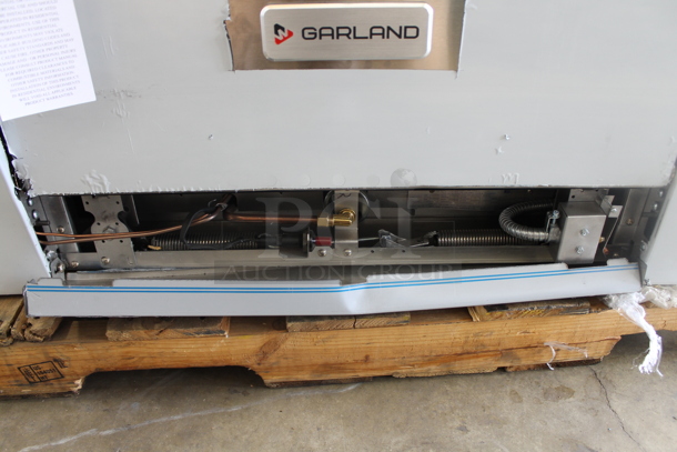 BRAND NEW SCRATCH AND DENT! LATE MODEL! Garland Stainless Steel Commercial Natural Gas Powered 6 Burner Range w/ Convection Oven, Over Shelf and Back Splash.  - Image 4 of 8
