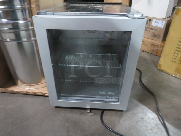 One WORKING RED BULL Countertop Stainless Steel 1 Door Glass Display Refrigerator With 1 Rack And KEYS. Model# SMALL. 110-120 Volt. 13.5X16X17 - Image 1 of 3