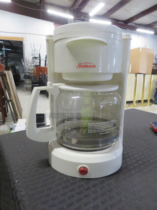 One Sunbeam Coffee Maker.