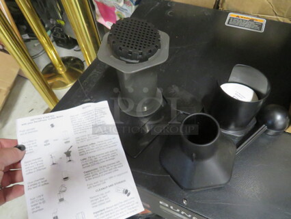 One NEW Aeropress.