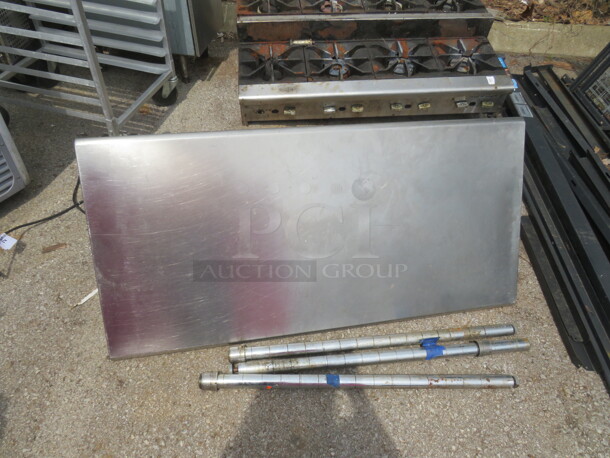 One Stainless Steel Table. Legs Need To Be Attached. 49.5X23.5X35 - Image 1 of 1