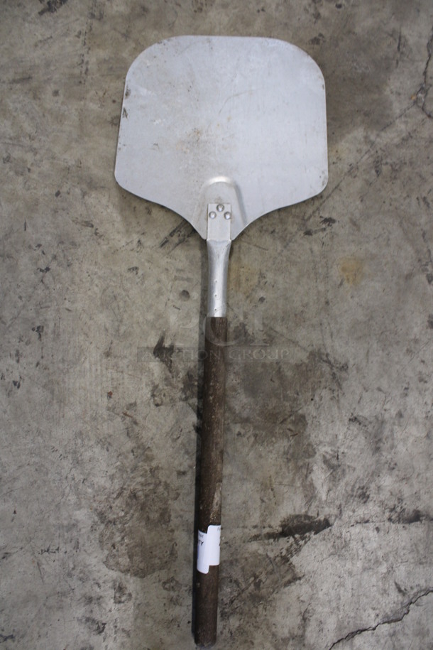 Metal Pizza Peel w/ Wooden Handle. 12x35x1