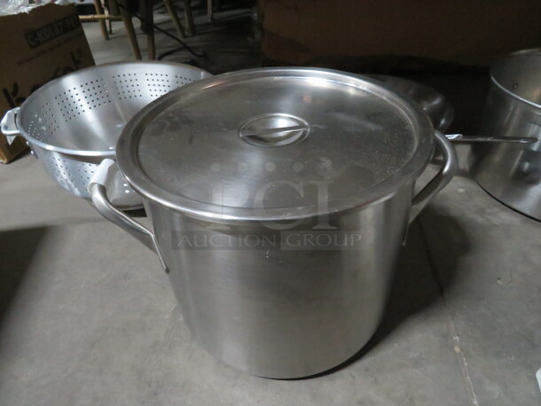 One 13X11 Stainless Steel Pan With Lid.