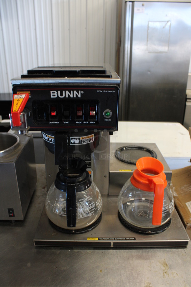 2012 Bunn Model CWTF15 Stainless Steel Commercial Countertop 3 Burner Coffee Machine w/ Poly Brew Basket and 2 Coffee Pots. 120 volts, 1 Phase. 16x21x17