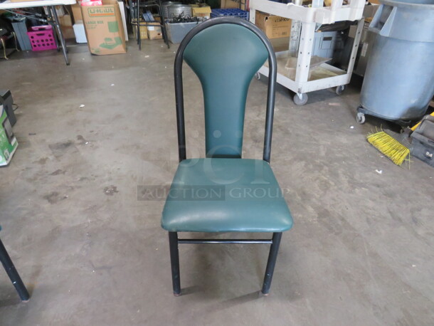 Black Metal Chair With A Green Cushioned Seat, And Back. 2XBID
