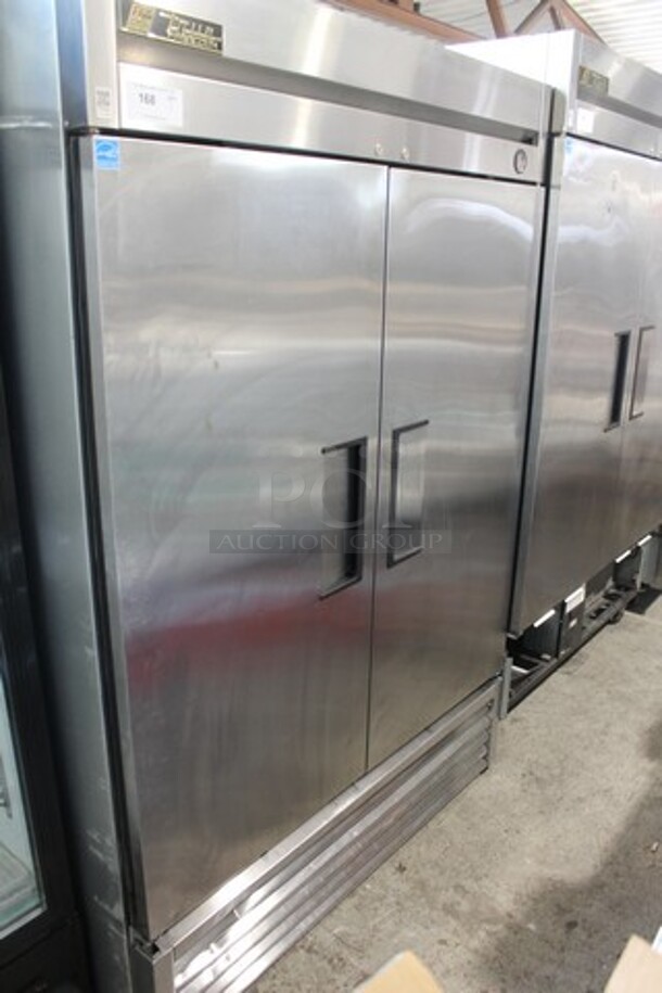 2014 True T-49F ENERGY STAR Stainless Steel Commercial 2 Door Reach In Freezer w/ Poly Coated Racks. Comes w/ Commercial Casters. 115 Volts, 1 Phase. Tested and Working!