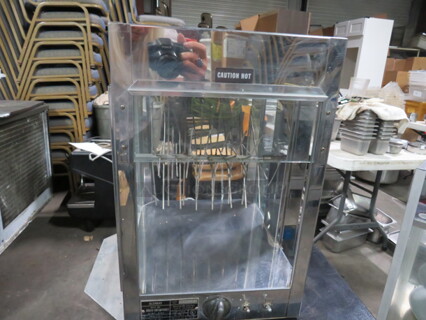 One Glen Ray Stainless Steel Hot Dog Rotisserie. Missing 1 Glass. Model#56. 120 Volt. 900 Watt. 17X14X18.5 