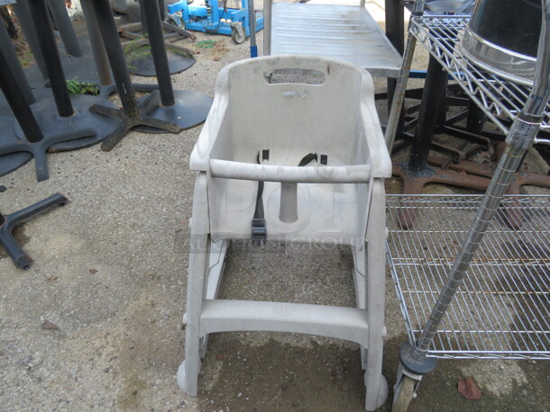One High Chair With Safety STraps. - Image 1 of 1