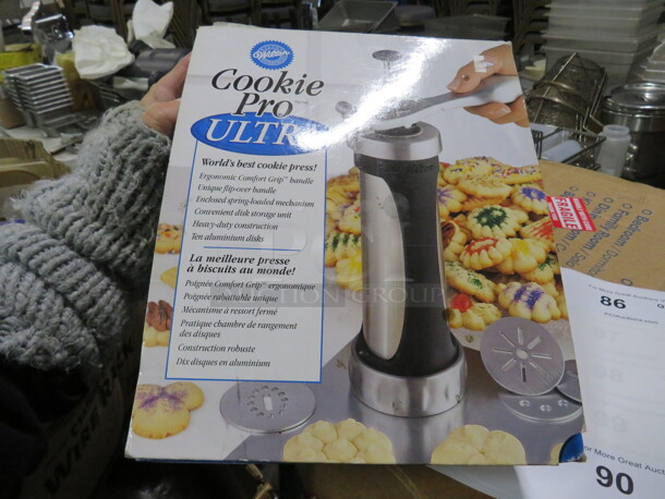 One NEW Wilton Cookie Pro Ultra.