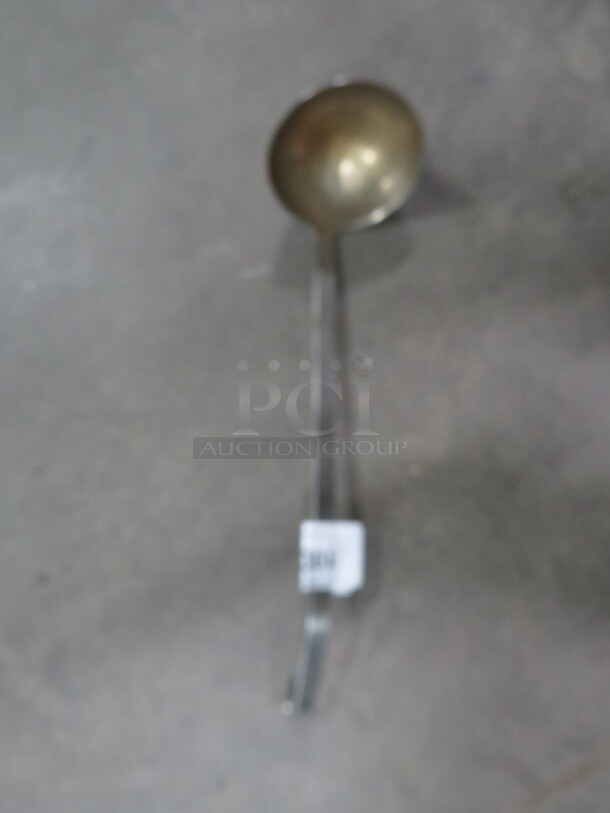 One Large Stainless Steel Ladle.