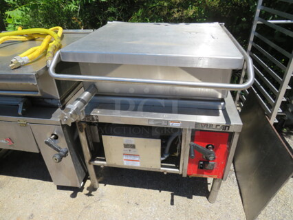 One Vulcan 30 Gallon Tilt Skillet. Model# VE30. 208/240 Volt. 3 Phase. 35.536X26.5. $25773.00