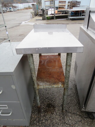 One Stainless Steel Table With Under Shelf. 18X30X36