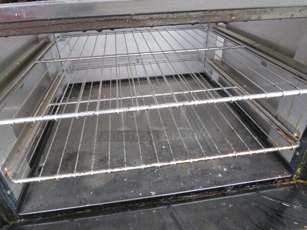 One Tristar Natural Gas 6 Burner/24 Inch Griddle Double Oven Range With 2 Racks And A  Stainless Steel Over Shelf On Casters. 60X33X57. Model# TSR-G24RH-6-E26L.  - Image 3 of 4