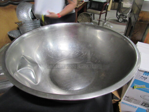 One 22.5 Inch Stainless Steel Mixing Bowl.