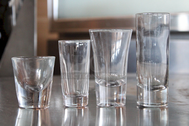 SCORE! Bus Tub Full Of Shot Glasses, 4 Sizes.
(Small to Large): S1 = 2; S2 = 11; S3 = 3; S4 = 20. 35x Your Bid  - Image 1 of 2