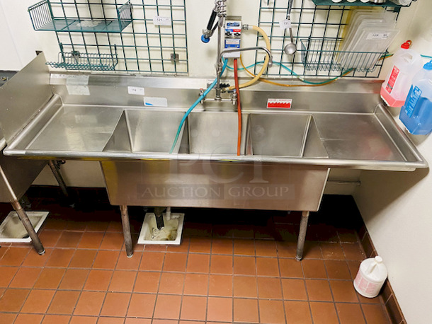BEAUTIFUL!! Duke Manufacturing SDTS-2116-32-18C 83" Stainless Steel Three Compartment Sink.                  .Condition: 9/10                      . Unit comes With Double Drainboards and Pre-Rinse Unit with Add a Faucet.                          . Sink bowls are 16x21x14 Inches Deep and Drainboards 18 inches wide.                                . 83x27x44 - Image 4 of 6