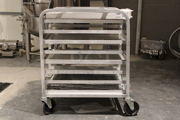 SWEET DEAL! Channel 430A 8 Pan Aluminum End Load Undercounter Sheet / Bun Pan Rack - Assembled, On Commercial Casters + Package Of ProPan Quilon-Coated Grease Pan Liners For Full Size Pans - Image 1 of 6