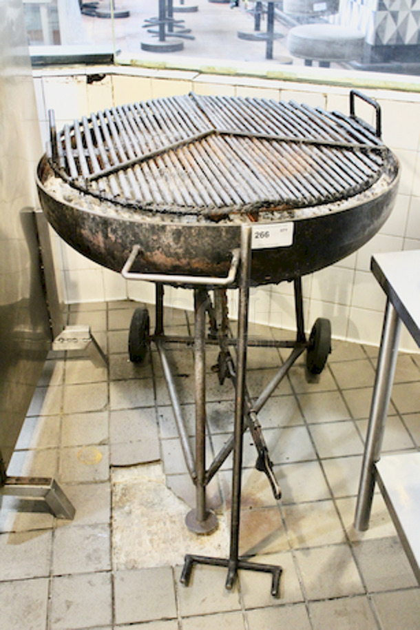 Round Charcoal Grill, Adjustable Height, Grate Spins, Comes With Grill Tools. 