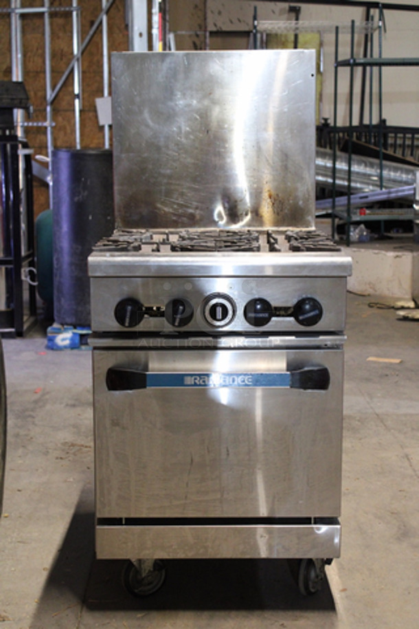 GENTLY USED! Radiance TAR-4, 163,000 Btu Gas Restaurant Range, 4 Burner, Standard Oven, Radiance Series, On Commercial Carters, Converted To Propane. 24x32x56-1/2