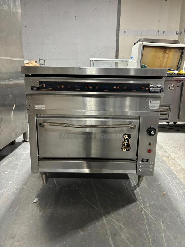 Amazing!! Montague model 136XLB/M14-14.0 Legend Heavy Duty Induction Range with gas oven
 - Image 1 of 5