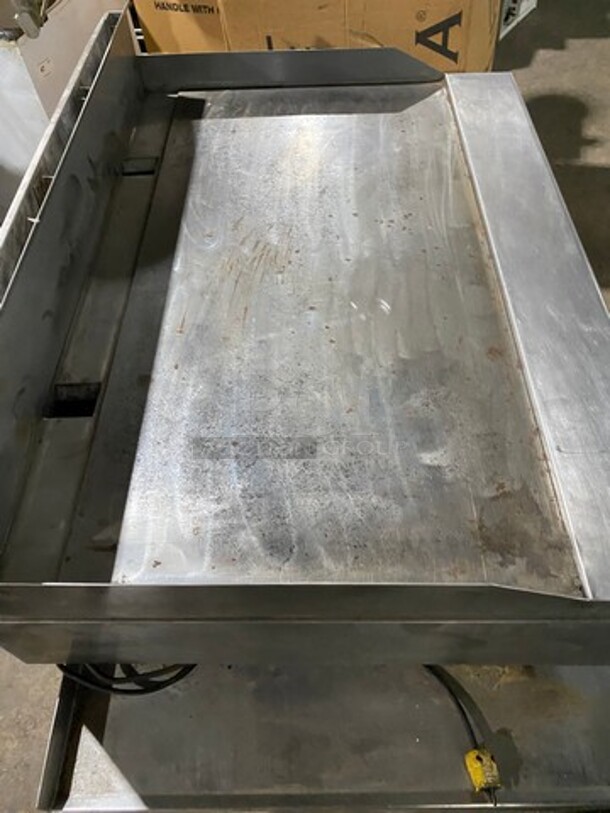 Garland Commercial Countertop Gas Powered Flat Griddle! With Back And Side Splashes! On Equipment Stand! With Storage Space Underneath! All Stainless Steel! On Casters! - Image 5 of 8