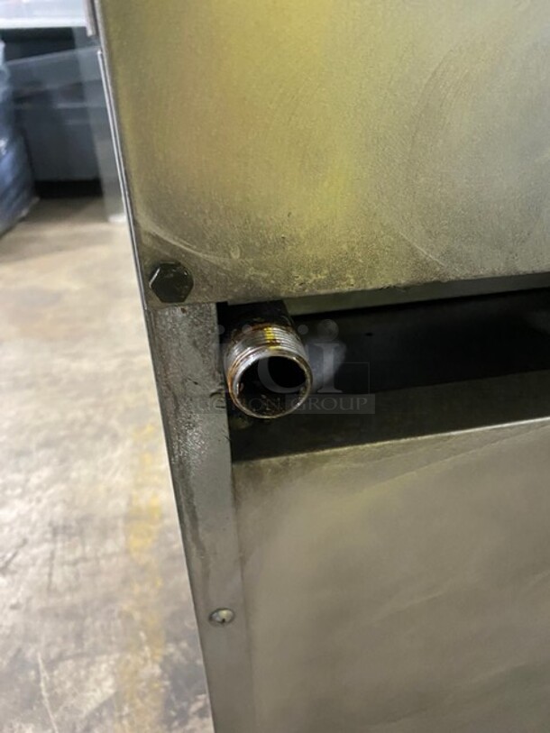 SouthBend Commercial Natural Gas Powered Split Top 4 Burner Stove! With Left Side Flat Griddle! With Full Sized Oven Underneath! With Backsplash! All Stainless Steel! With Metal Oven Racks! On Casters! Model: X336D-1GL SN: 04C65469! - Image 11 of 12