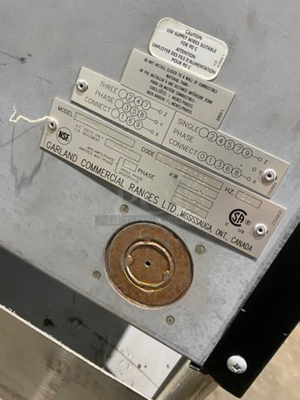 WOW! NEW! NEVER USED! Garland Commercial Countertop Electric Powered Flat Top Griddle! With Back And Side Splashes! On Legs! On Equipment Stand! All Stainless Steel! On Casters! Model: E2448G SN: 0404ME0033 208V 60HZ 3 Phase - Image 9 of 10