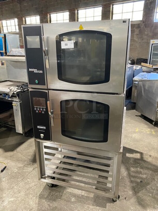 SUPER! Belshaw Adamatic Commercial Electric Powered Double Deck Combi Oven! With View Through Doors! With Pan Racks Underneath! All Stainless Steel! On Casters! 2x Your Bid Makes One Unit! Model: FG189UZ84 SN: 2000003710FA032620 208/220V 60HZ 3 Phase