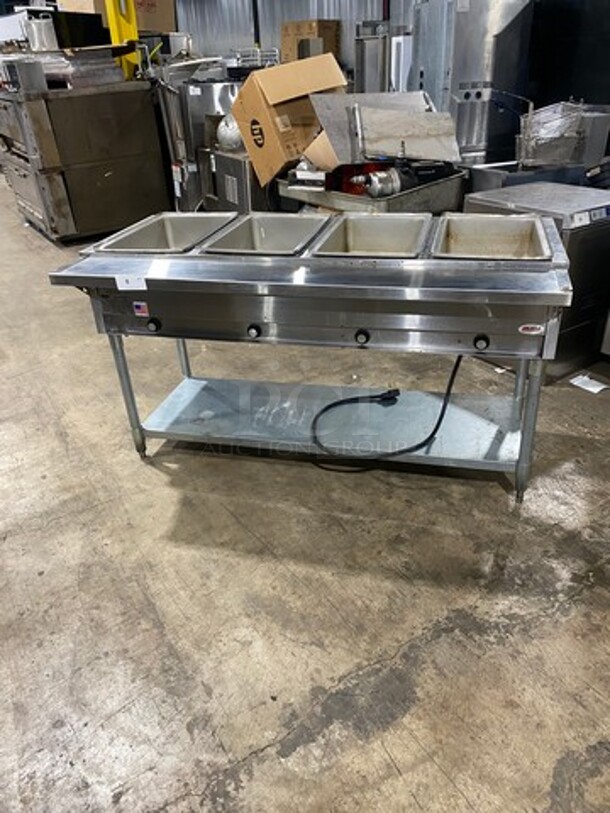 NICE! Eagle Commercial Electric Powered 4 Well Steam Table! With Storage Space Underneath! All Stainless Steel! On Legs! Model: DHT4120 SN: 2106100056 120V 60HZ 1 Phase! Working When Removed!